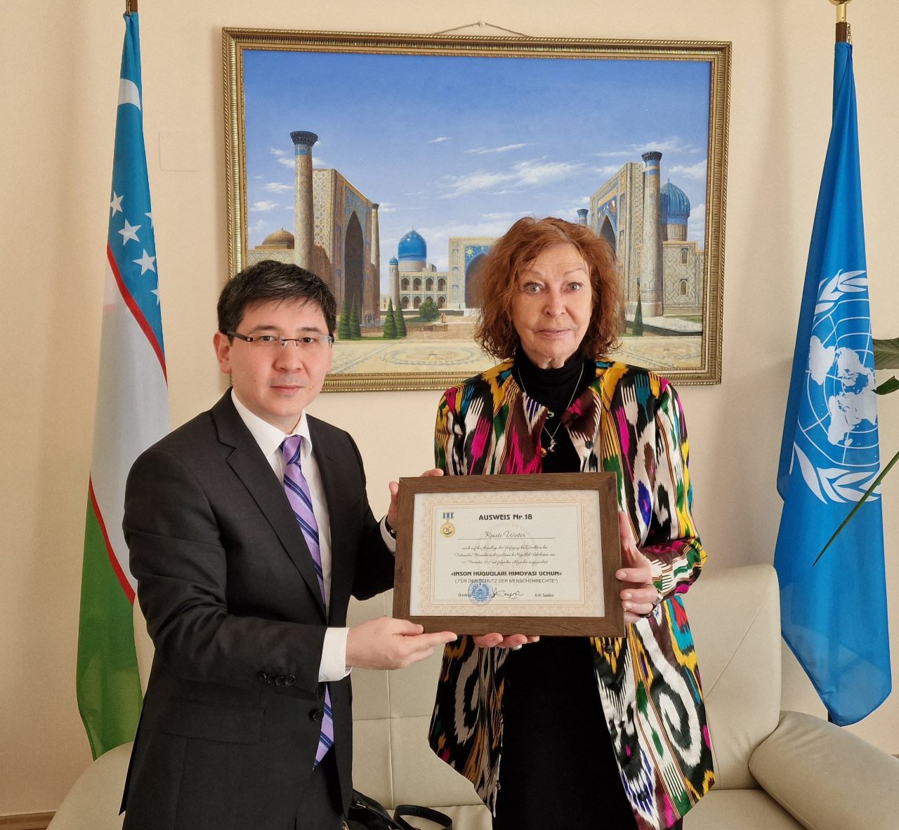 The Ambassador of Uzbekistan presented Renata Winter with a badge